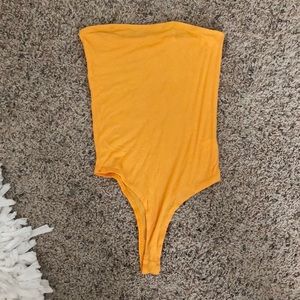 Yellow/orange strapless bodysuit